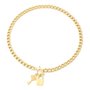 Golden Cuban chain necklace set with lock and clover key pendants on white background