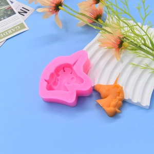 Pink silicone unicorn mold for DIY chocolate, candles and fondant cake decoration