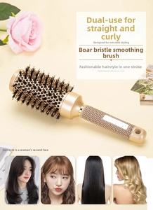 Detail of round golden thermal hair brush with boar bristles and non-slip handle