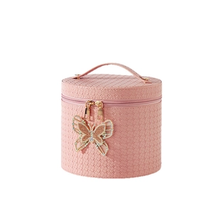 Neceser redondo de cuero PU rosa con colgante de mariposa de diamantes y cremallera dorada
