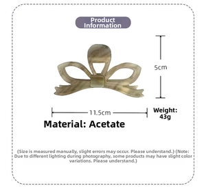 Dettaglio della molletta a fiocco in acetato marmorizzato da 11,5 cm con misure