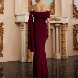 Detail of burgundy off-shoulder evening dress featuring elegant draped sleeves and back view