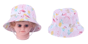 Detail view of flamingo and pineapple print on a pink and white kids bucket hat