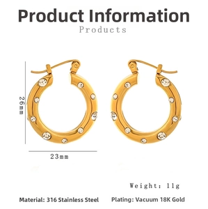 Detail of 26mm gold hoop earrings in stainless steel with crystal pavé and size marks