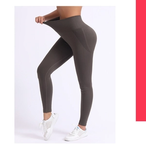 Close-up showing the high elasticity and stretch of the seamless high waist yoga pants