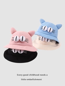 Detail of cute cat ear sun hats for toddlers in pink, blue, beige, and black colors
