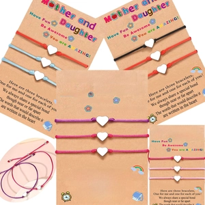 Adjustable heart charm bracelets set for mother and daughter with woven wax cord