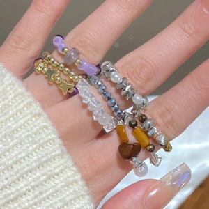 Bohemian multilayered beaded ring set with lavender beads and gold star charms