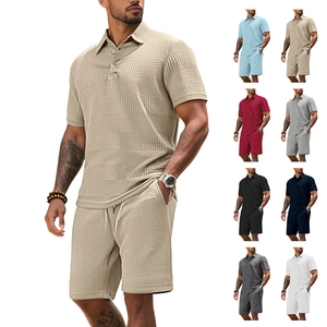 Detailed waffle knit texture and fabric closeup of khaki men's short sleeve polo set