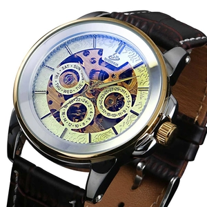 Detailed close-up of a skeleton mechanical watch with golden gears and a brown leather strap