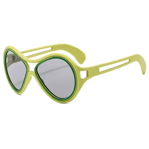Fashionable oversized irregular frame sunglasses with pale yellow-green finish and grey lenses