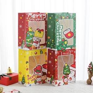 Christmas gift paper bags with window and festive prints in red, green and yellow colors
