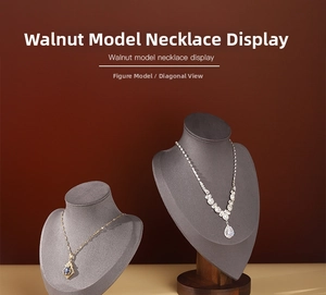 Walnut base necklace display stand featuring two mannequin busts for jewelry showcasing