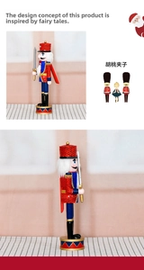 Detailed view of a 36cm wooden nutcracker soldier with red sequins and a silver sword