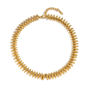 Detail of gold bullet link necklace with S.STEEL hallmark and lobster clasp