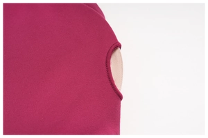 Detailed close-up of dark rose yoga vest fabric with high-quality stitching and padding