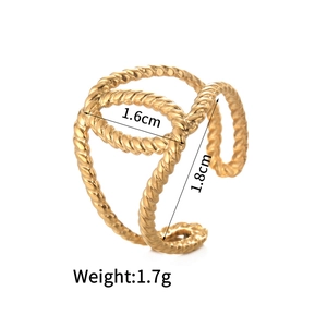 Detail view of 14K gold stainless steel twisted ring with size and weight specs