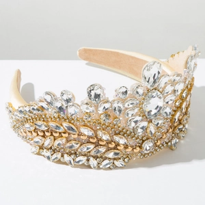 Detail shot of golden baroque crown headband featuring sparkling clear rhinestones