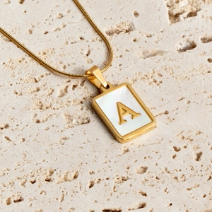 Gold stainless steel square mother of pearl pendant necklace featuring capital letter A