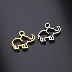 Detailed view of hollow elephant pendants in gold and silver finish for DIY jewelry
