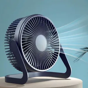 Desktop USB fan in dark blue with adjustable U-shaped stand on a minimalist pedestal