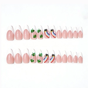 Glossy almond press-on nails featuring green clover and rainbow French tip patterns