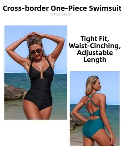 Detail of slimming one-piece swimsuit with halter neck and metallic ring decoration