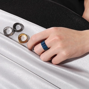 Men's 10mm wide stainless steel rings with wave texture in gold, silver, black, and blue