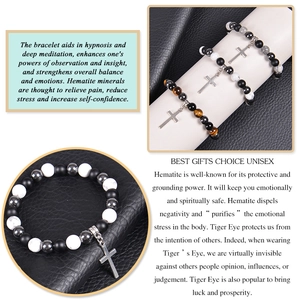 Detail showing Tiger Eye and Hematite beaded bracelets with metal cross charms