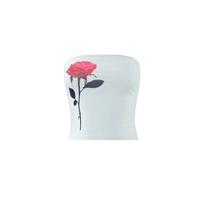 Detailed close-up of a white tube top featuring a large red rose floral print design