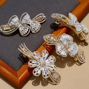 Luxurious gold alloy hair clips with white crystals and sparkling zircon butterflies