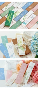 Detail of floral letterpress bookmarks on specialty paper in vintage gift box