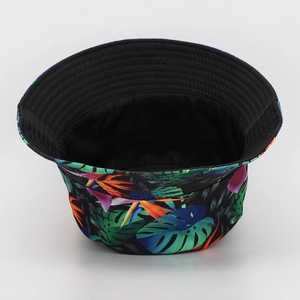 Detailed close-up view of tropical floral print bucket hat with black inner lining