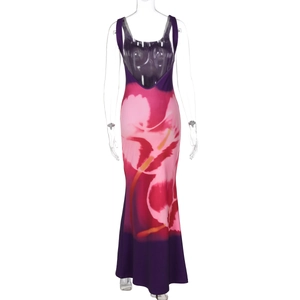 Detail of a floral print maxi dress with deep V-neck and pink purple gradient patterns