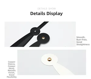 Close-up of quartz clock hands showing copper bushing and smooth metal finish details