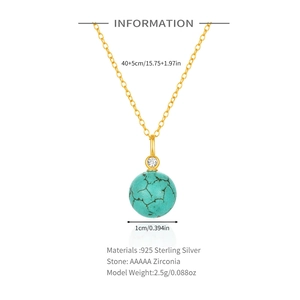Detail of 925 sterling silver necklace with green turquoise pendant and size markings
