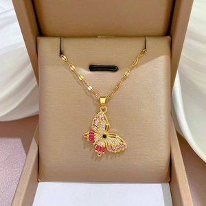Exquisite titanium gold butterfly necklace with pink and white cubic zirconia in jewelry box