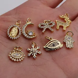 Gold-plated butterfly and evil eye charms with cubic zirconia for jewelry making