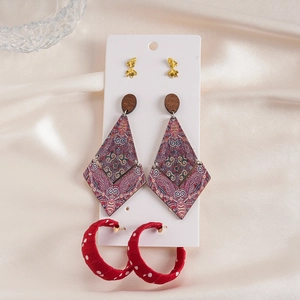 Set of 6 ethnic style geometric wood and fabric drop earrings on display card