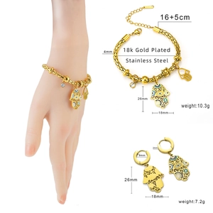 18k vergulde Hamsa-hand en Evil Eye sieradenset met armband en bijpassende oorbellen