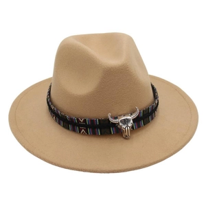 Detail showing the woven ethnic band and vintage silver bull skull ornament on the felt hat