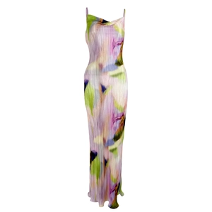 Detail of artistic watercolor print on pleated slim fit maxi dress fabric texture