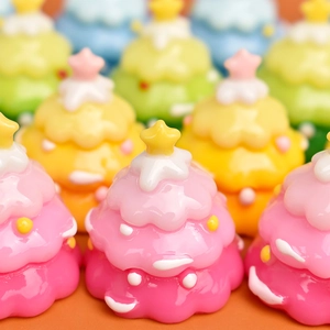 Detailed view of colorful gradient resin Christmas tree charms for DIY crafts