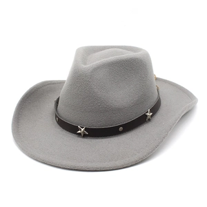 Detail of the gray felt cowboy hat featuring silver stars on a leather decorative band