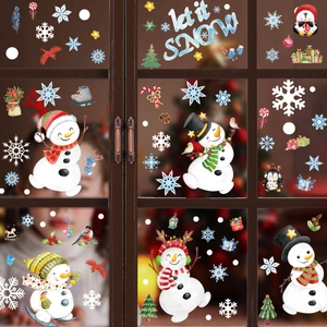 Christmas window stickers with watercolor snowman and let it snow text on wooden frame