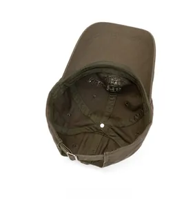 Detail of cotton baseball cap internal structure with metal buckle and reinforced seams