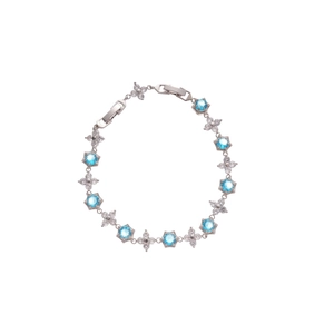 Elegant silver bracelet with blue zircon flower charms and hexagon fold-over clasps