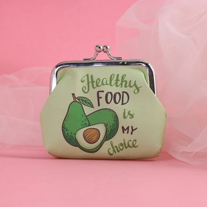 Detailed view of green avocado coin purse with kiss-lock clasp and healthy food print