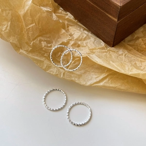 Minimalist S925 sterling silver rings with diamond-cut texture in a four-piece set