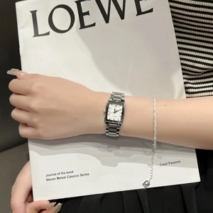Elegant square silver quartz watch for women featuring a white dial and calendar function